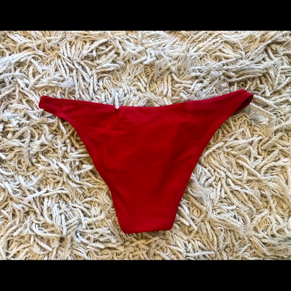 Sexy little red bikini bottom. Slight wear and still good quality.